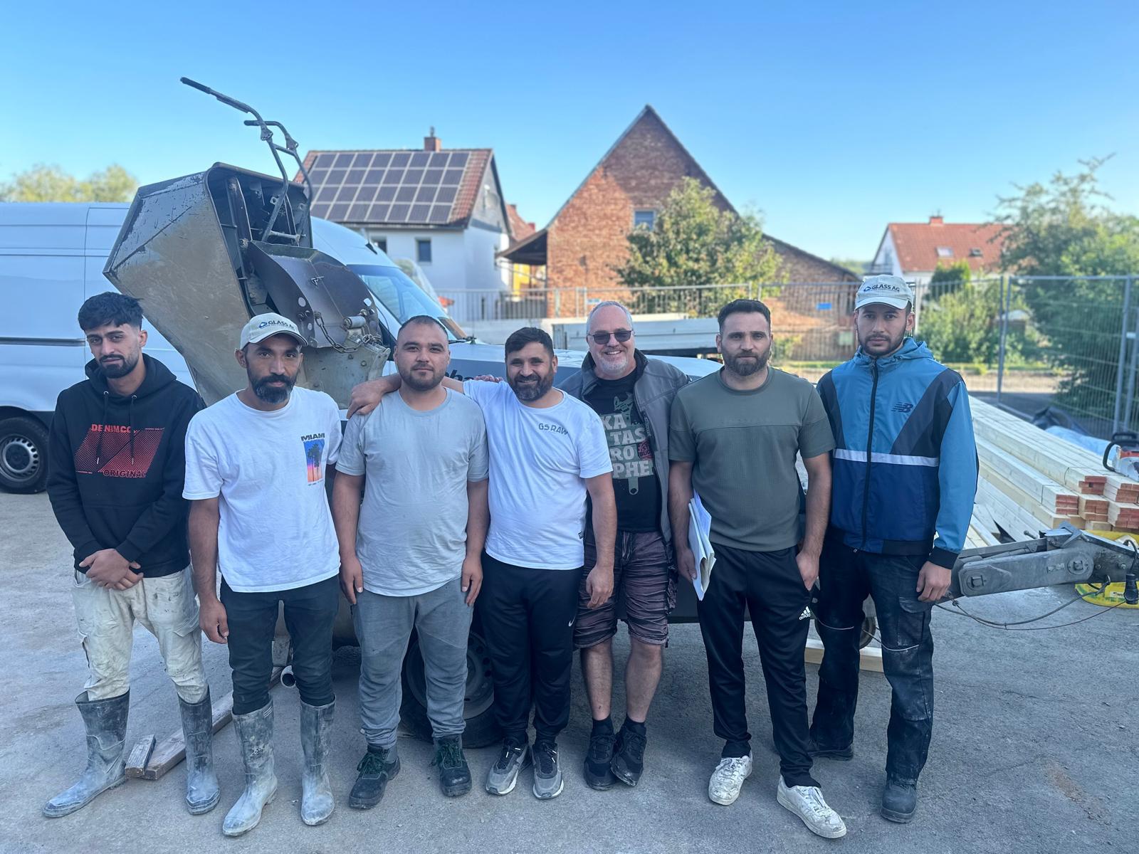 Gruppe von Bauarbeitern im Freien